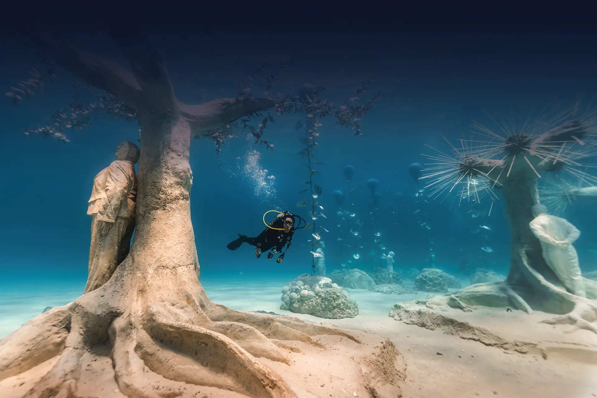Diver exploring the MUSAN underwater sculpture museum in Ayia Napa, Cyprus