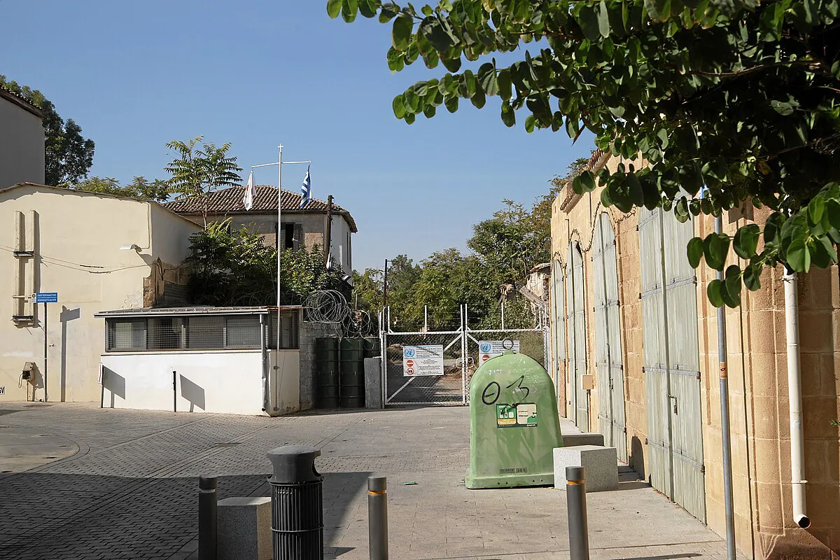 The UN buffer zone (Green Line) in Nicosia, Cyprus, with barbed wire and abandoned buildings