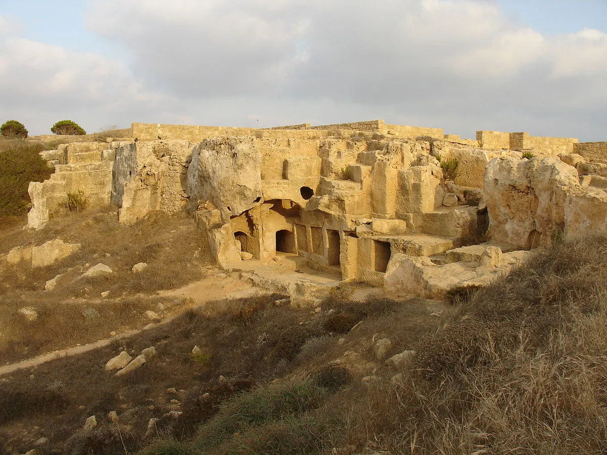 The underground Tombs of the Kings carved into rock in Paphos, Cyprus, with Doric columns surrounding an open atrium